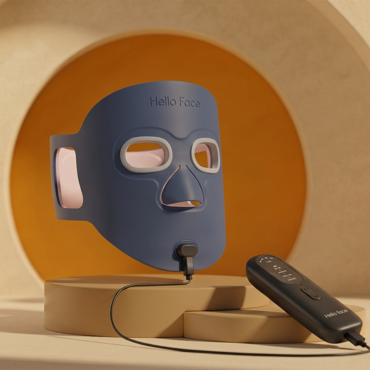 Hello Face M500S LED face mask in blue with handheld controller on a podium